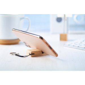 Fotografie k reklamnímu předmětu „stojánek na mobil s přívěškem na klíče“