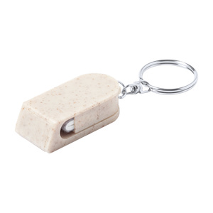 Fotografie k reklamnímu předmětu „přívěšek na klíče se stojánkem na mobil“