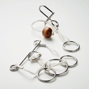 Fotografie k reklamnímu předmětu „Sada 2 kovových hlavolamů CONNECTION“